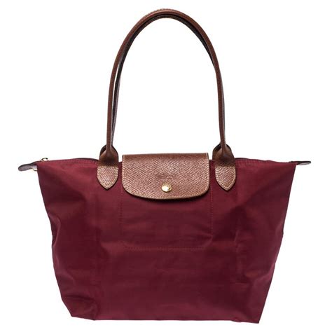 longchamp le pliage burgundy.